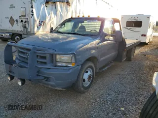 2002 Ford F-350 with VIN 1FDWF36F62EB93875, listed as a Copart auction lot 86976314 with 150,681 mi miles and Salvage title. Bid and sale history available at DreamBid. Image 1.