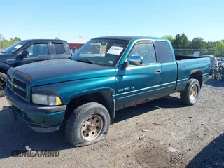 1997 Dodge 1500 with VIN 1B7HF13Z0VJ542945, listed as a IAAI auction lot 42100061 with 142,749 mi miles and . Bid and sale history available at carsss.com. Image 2.