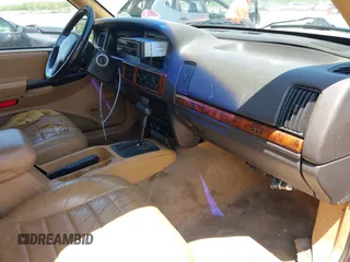 1997 Jeep Grand Cherokee TSi with VIN 1J4FX58S2VC747897, listed as a IAAI auction lot 42033868 with 119,924 mi miles. Bid and sale history available at carsss.com. Image 5.