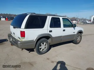 2001 Oldsmobile Bravada with VIN 1GHDT13W512107415, listed as a IAAI auction lot 41678324 with 256,968 mi miles. Bid and sale history available at carsss.com. Image 4.