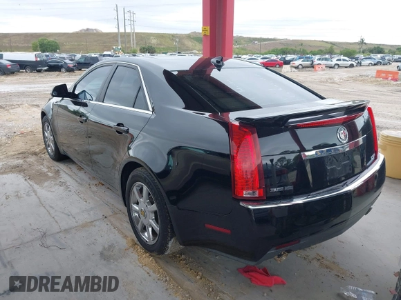 2009 Cadillac CTS RWD w/1SB with VIN 1G6DU57V290147277, listed as a IAAI auction lot 41995209 with 120,576 mi miles. Bid and sale history available at carsss.com. Image 3.