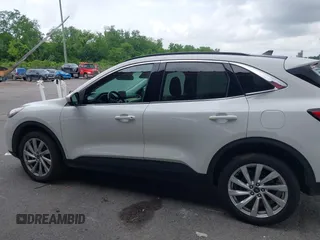 2021 Ford Escape Titanium with VIN 1FMCU9J93MUA36648, listed as a IAAI auction lot 42055229 with 122,864 mi miles and . Bid and sale history available at carsss.com. Image 14.