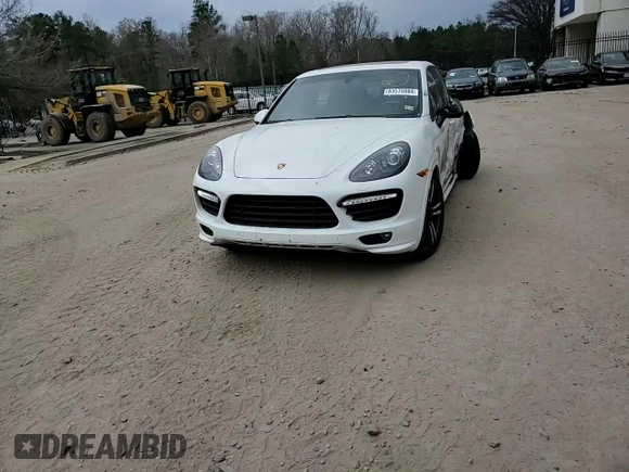 2013 Porsche Cayenne GTS with VIN WP1AD2A24DLA76344, listed as a Copart auction lot 83570884 with 63,704 mi miles and Salvage title. Bid and sale history available at DreamBid. Image 12.