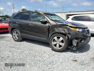 2012 Kia Sorento EX with VIN 5XYKU3A67CG273792, listed as a Copart auction lot 63869745 with Not provided miles and Salvage title. Bid and sale history available at DreamBid. Image 4.