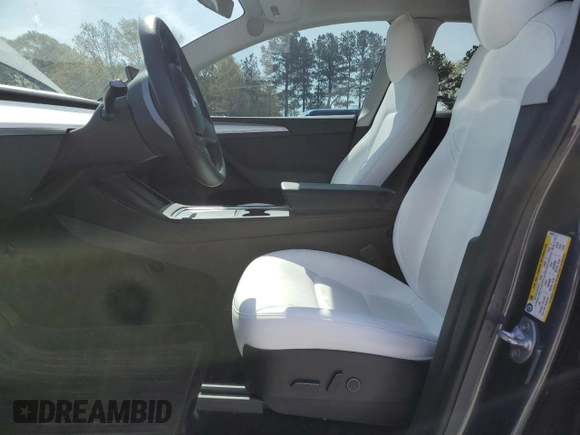2023 Tesla Model Y Long Range z VIN 7SAYGAEE9PF662103, wystawiony jako Copart lot #51332105 z przebiegiem 35 294 mil mil oraz Szkoda całkowita • Salvage title. Historia ofert i sprzedaży dostępna na DreamBid. Obrazek 7.