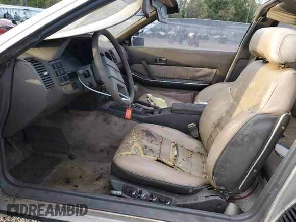 1984 Nissan 300ZX z VIN JN1HZ16S5EX016042, wystawiony jako Copart lot #86071904 z przebiegiem Nie podano mil oraz Szkoda całkowita • Salvage title. Historia ofert i sprzedaży dostępna na DreamBid. Obrazek 7.
