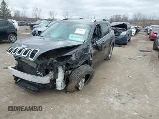 2015 Jeep Cherokee Limited with VIN 1C4PJMDS5FW587879, listed as a IAAI auction lot 41864622 with 143,843 mi miles. Bid and sale history available at carsss.com. Image 2.