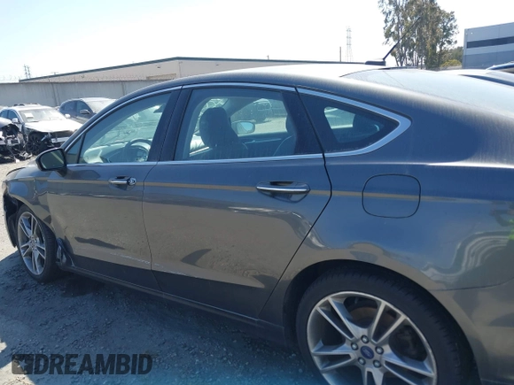 2015 Ford Fusion Titanium with VIN 3FA6P0D99FR258028, listed as a IAAI auction lot 41700630 with 82,084 mi miles. Bid and sale history available at carsss.com. Image 14.