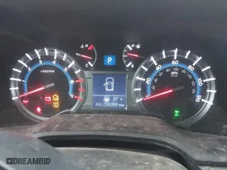 2014 Toyota 4Runner Limited with VIN JTEBU5JR1E5201256, listed as a IAAI auction lot 41674334 with 236,059 mi miles. Bid and sale history available at carsss.com. Image 7.