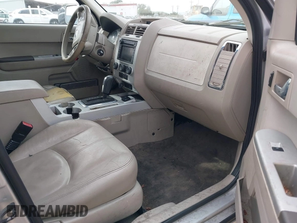 2008 Mercury Mariner with VIN 4M2CU39H58KJ39854, listed as a IAAI auction lot 41567810 with 267,329 mi miles and . Bid and sale history available at DreamBid. Image 5.