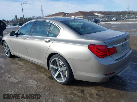2012 BMW 7 Series 740i with VIN WBAKA4C58CDS99381, listed as a IAAI auction lot 41655715 with 112,731 mi miles and . Bid and sale history available at DreamBid. Image 3.