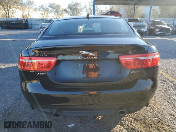 2018 Jaguar XE 25t with VIN SAJAR4FX6JCP27215, listed as a Copart auction lot 88518935 with 75,559 mi miles and Salvage Title. Bid and sale history available at carsss.com. Image 6.