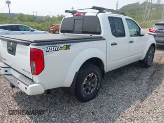 2020 Nissan Frontier SV with VIN 1N6ED0EB2LN716262, listed as a IAAI auction lot 42392068 with 33,385 mi miles and . Bid and sale history available at DreamBid. Image 4.