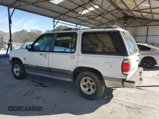 1997 Ford Explorer XLT with VIN 1FMDU32P7VUA19965, listed as a Copart auction lot 79505124 with 140,231 mi miles and Salvage title. Bid and sale history available at DreamBid. Image 2.