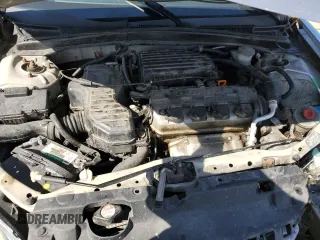 2005 Honda Civic VP z VIN 1HGES16365L020896, wystawiony jako Copart lot #52105605 z przebiegiem 116 809 mil mil oraz Szkoda całkowita • Salvage title. Historia ofert i sprzedaży dostępna na DreamBid. Obrazek 11.