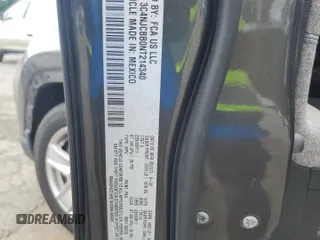 2022 Jeep Compass Altitude z VIN 3C4NJCBB0NT214340, wystawiony jako Copart lot #58775685 z przebiegiem 68 473 mil mil oraz Szkoda całkowita • Salvage title. Historia ofert i sprzedaży dostępna na DreamBid. Obrazek 13.