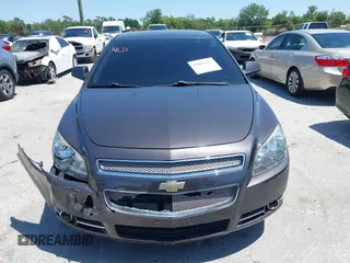 2011 Chevrolet Malibu LTZ with VIN 1G1ZE5E75BF184694, listed as a IAAI auction lot 42002433 with 185,724 mi miles and . Bid and sale history available at DreamBid. Image 12.