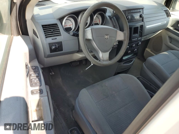 2009 Dodge Grand Caravan SE with VIN 1D8HN44E29B509835, listed as a Copart auction lot 56311925 with 105,108 mi miles and Salvage title. Bid and sale history available at DreamBid. Image 8.