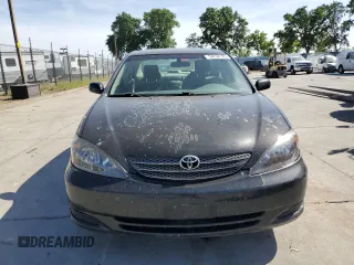 2004 Toyota Camry LE with VIN 4T1BE32K14U318133, listed as a Copart auction lot 54238185 with 293,761 mi miles and Salvage Title. Bid and sale history available at carsss.com. Image 5.