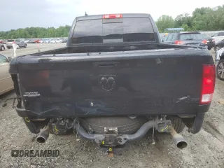 2018 Ram 1500 Lone Star Silver z VIN 1C6RR6LT4JS219367, wystawiony jako Copart lot #57609074 z przebiegiem 91 422 mil mil oraz Szkoda całkowita • Salvage title. Historia ofert i sprzedaży dostępna na DreamBid. Obrazek 6.