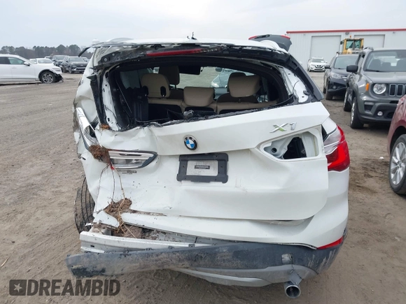 2018 BMW X1 xDrive28i with VIN WBXHT3C31J5K22765, listed as a IAAI auction lot 41800397 with 110,205 mi miles and . Bid and sale history available at DreamBid. Image 16.