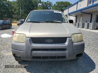 2004 Ford Escape XLT with VIN 1FMCU03134KB53192, listed as a Copart auction lot 62178075 with 223,637 mi miles and Salvage title. Bid and sale history available at DreamBid. Image 5.