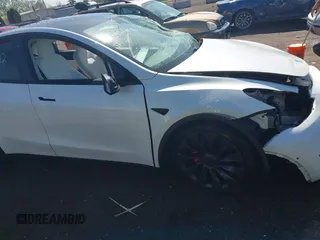 2021 Tesla Model Y Performance z VIN 5YJYGDEF0MF076263, wystawiony jako IAAI lot #42134022 z przebiegiem Nie podano mil oraz . Historia ofert i sprzedaży dostępna na DreamBid. Obrazek 20.