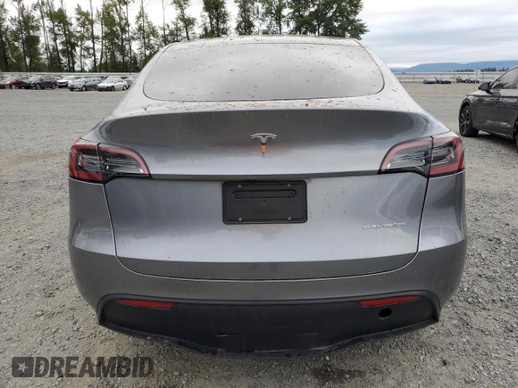 2024 Tesla Model Y Long Range with VIN 7SAYGDEE1RF159332, listed as a Copart auction lot 61179495 with 9,259 mi miles and Salvage title. Bid and sale history available at DreamBid. Image 6.