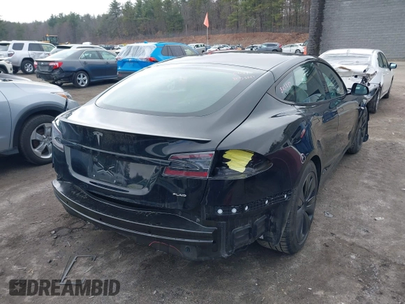 2021 Tesla Model S Plaid with VIN 5YJSA1E69MF439147, listed as a IAAI auction lot 41825656 with 25,626 mi miles. Bid and sale history available at carsss.com. Image 4.