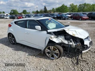 2016 Hyundai Veloster z VIN KMHTC6AD2GU272413, wystawiony jako Copart lot #55530805 z przebiegiem Nie podano mil oraz Szkoda całkowita • Salvage title. Historia ofert i sprzedaży dostępna na DreamBid. Obrazek 4.