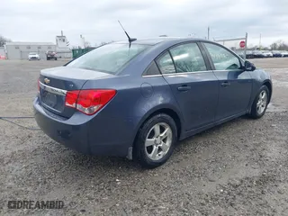 2014 Chevrolet Cruze 1LT with VIN 1G1PC5SB0E7213216, listed as a IAAI auction lot 41955710 with 147,003 mi miles. Bid and sale history available at carsss.com. Image 4.