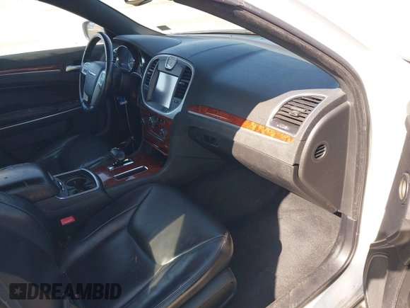 2012 Chrysler 300 Limited with VIN 2C3CCACG4CH250588, listed as a IAAI auction lot 41943257 with 236,242 mi miles and . Bid and sale history available at DreamBid. Image 5.