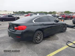 2016 BMW 4 Series 428i xDrive with VIN WBA4C9C58GG136248, listed as a IAAI auction lot 41346270 with 129,464 mi miles and . Bid and sale history available at carsss.com. Image 4.