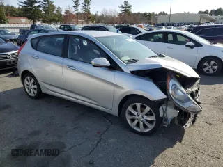 2012 Hyundai Accent SE z VIN KMHCU5AE2CU010532, wystawiony jako Copart lot #49165705 z przebiegiem Nie podano mil oraz Szkoda całkowita • Salvage title. Historia ofert i sprzedaży dostępna na DreamBid. Obrazek 4.