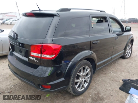 2013 Dodge Journey R/T with VIN 3C4PDDEG7DT591789, listed as a IAAI auction lot 40843769 with 188,001 mi miles and . Bid and sale history available at DreamBid. Image 4.