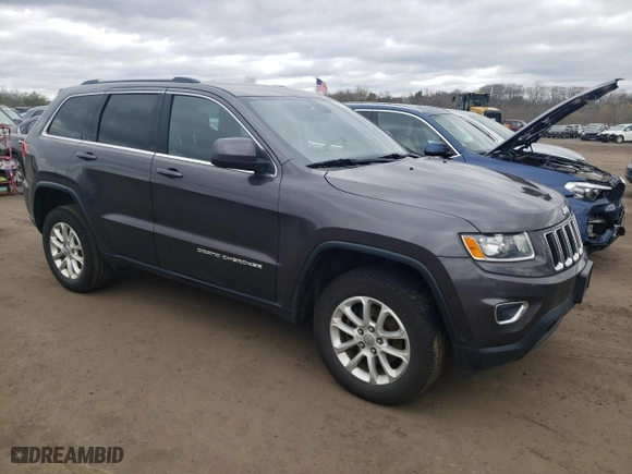 2015 Jeep Grand Cherokee Altitude with VIN 1C4RJFAG0FC209734, listed as a Copart auction lot 52973105 with 130,955 mi miles and Salvage Title. Bid and sale history available at carsss.com. Image 4.