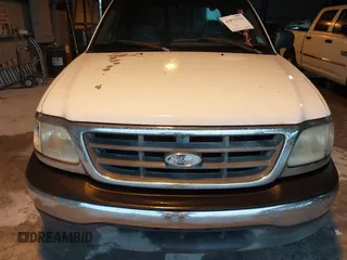 2002 Ford F-150 XL with VIN 1FTRX17L52NA38404, listed as a IAAI auction lot 41871731 with 366,564 mi miles. Bid and sale history available at carsss.com. Image 6.