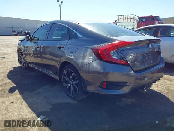 2019 Honda Civic Sport with VIN 19XFC2F82KE019704, listed as a IAAI auction lot 41770051 with 90,011 mi miles and . Bid and sale history available at DreamBid. Image 3.