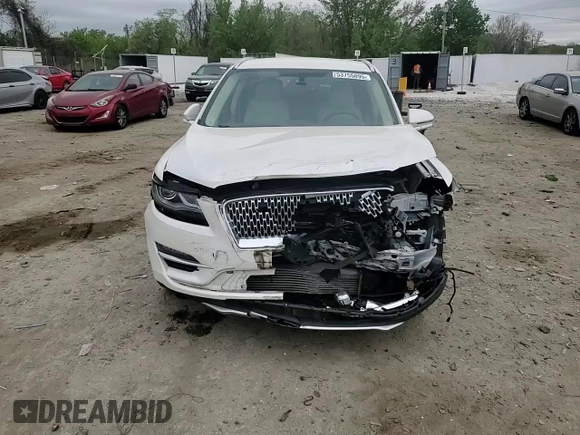 2019 Lincoln MKC Select z VIN 5LMCJ2D99KUL39648, wystawiony jako Copart lot #53755895 z przebiegiem 57 623 mil mil oraz Szkoda całkowita • Salvage title. Historia ofert i sprzedaży dostępna na DreamBid. Obrazek 14.