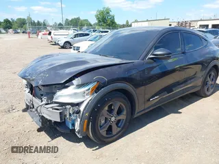 2022 Ford Mustang Mach-E Select z VIN 3FMTK1SS9NMA18394, wystawiony jako IAAI lot #40067340 z przebiegiem 35 805 mil mil oraz . Historia ofert i sprzedaży dostępna na DreamBid. Obrazek 2.