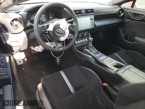 2023 Toyota GR86 Premium with VIN JF1ZNBF12P8765815, listed as a Copart auction lot 69377494 with 5,382 mi miles and Salvage Title. Bid and sale history available at carsss.com. Image 8.