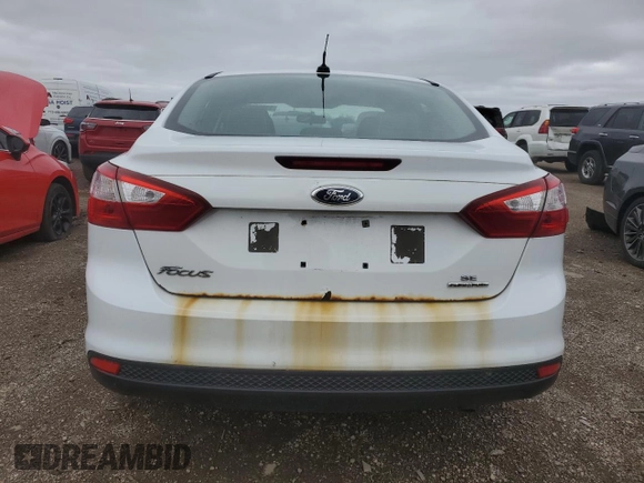 2012 Ford Focus SE z VIN 1FAHP3F28CL399774, wystawiony jako Copart lot #53830855 z przebiegiem 175 442 mil mil oraz Czysty tytuł • Clean title. Historia ofert i sprzedaży dostępna na DreamBid. Obrazek 6.