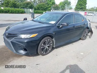 2019 Toyota Camry LE z VIN 4T1B11HK2KU281694, wystawiony jako IAAI lot #42289169 z przebiegiem 111 058 mil mil oraz . Historia ofert i sprzedaży dostępna na DreamBid. Obrazek 2.