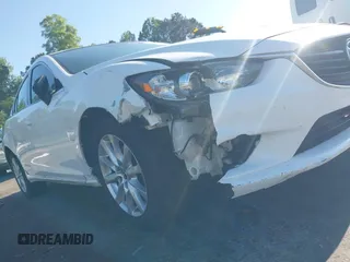 2014 Mazda 6 i Sport with VIN JM1GJ1U58E1105376, listed as a IAAI auction lot 42024402 with 124,233 mi miles. Bid and sale history available at carsss.com. Image 17.