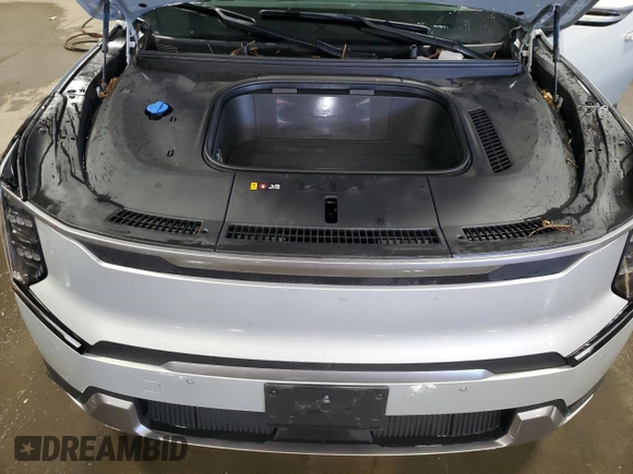 2024 Kia EV9 Wind z VIN KNDAFFS58R6018738, wystawiony jako Copart lot #47033525 z przebiegiem 18 434 mil mil oraz Szkoda całkowita • Salvage title. Historia ofert i sprzedaży dostępna na DreamBid. Obrazek 13.