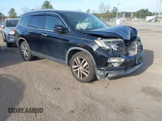 2017 Honda Pilot Touring with VIN 5FNYF6H9XHB062171, listed as a IAAI auction lot 41927969 with 210,633 mi miles. Bid and sale history available at carsss.com. Image 1.