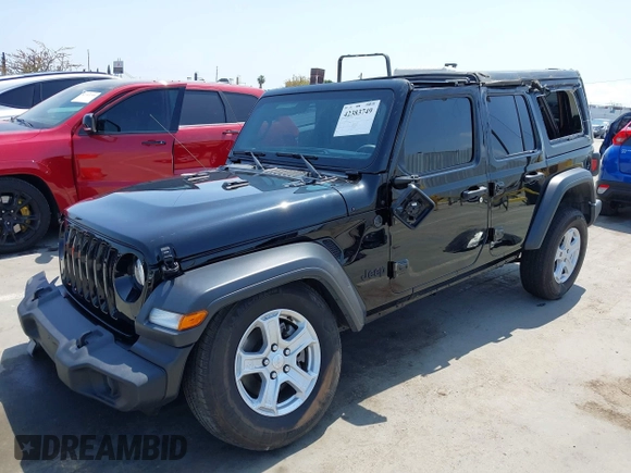 2023 Jeep Wrangler Willys with VIN 1C4HJXDG5PW615358, listed as a IAAI auction lot 42383749 with 31,988 mi miles and . Bid and sale history available at DreamBid. Image 2.