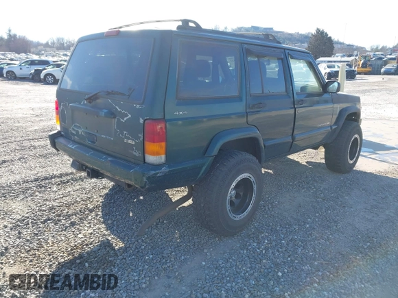 2001 Jeep Cherokee Sport with VIN 1J4FF58S41L619254, listed as a IAAI auction lot 41596384 with 180,826 mi miles and . Bid and sale history available at DreamBid. Image 4.