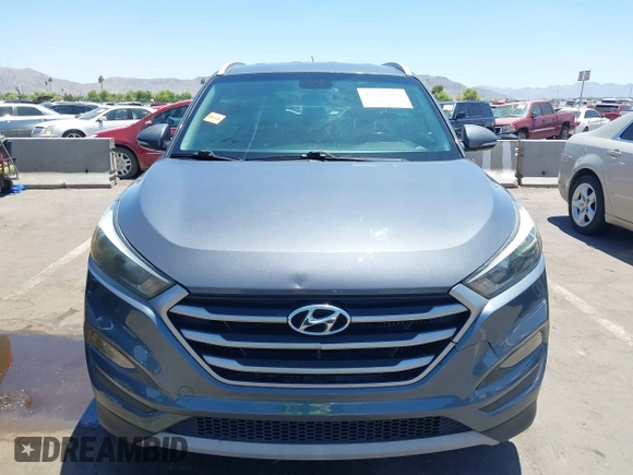 2017 Hyundai Tucson Value with VIN KM8J33A29HU312752, listed as a IAAI auction lot 42575164 with 76,297 mi miles and . Bid and sale history available at DreamBid. Image 12.