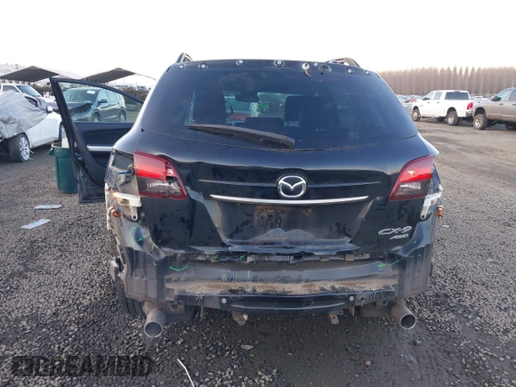 2014 Mazda CX-9 Grand Touring with VIN JM3TB3DV7E0429276, listed as a IAAI auction lot 41415446 with 94,939 mi miles and . Bid and sale history available at DreamBid. Image 6.